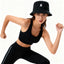 Woman wearing a cool bucket hat 